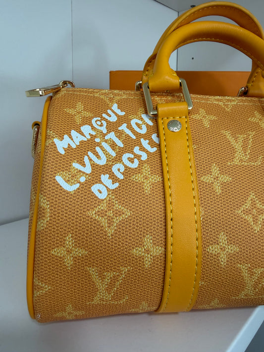LOUIS VUITTON Keepall Bandouliere 25 (Yellow)
