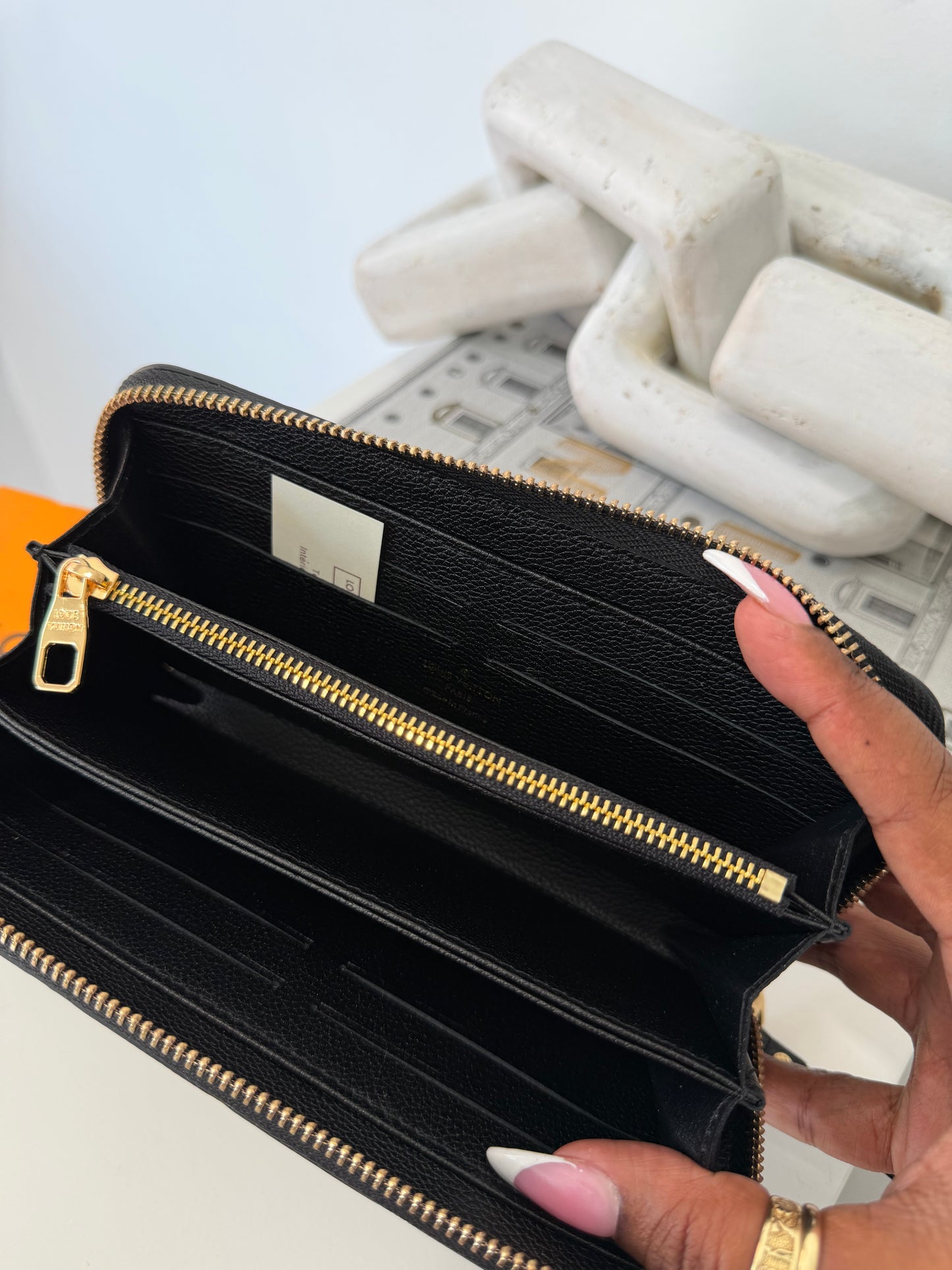 LOUIS VUITTON Embossed Monogram Zippy Wallet