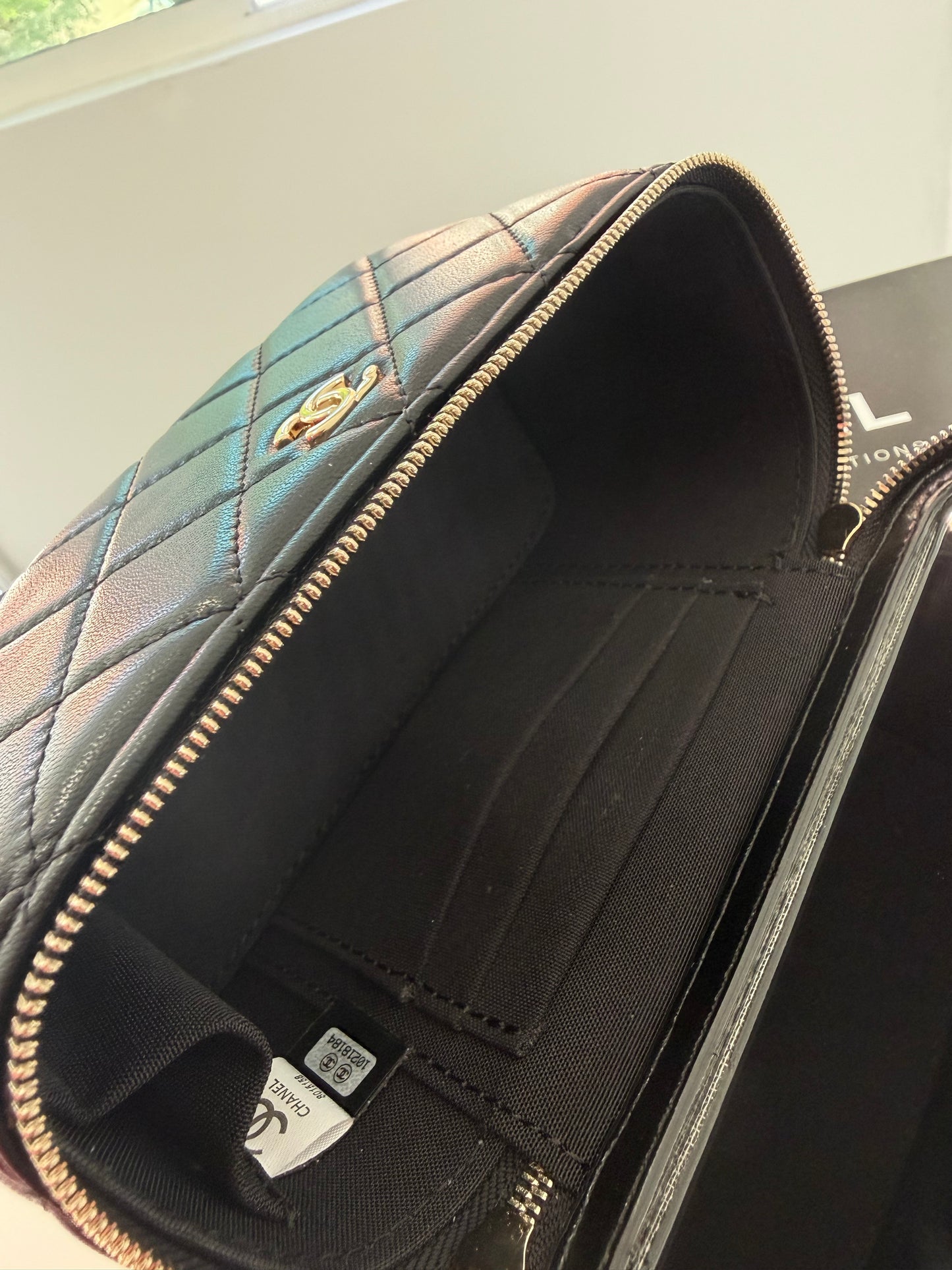 CHANEL Quilted Black Crossbody (with top handle)
