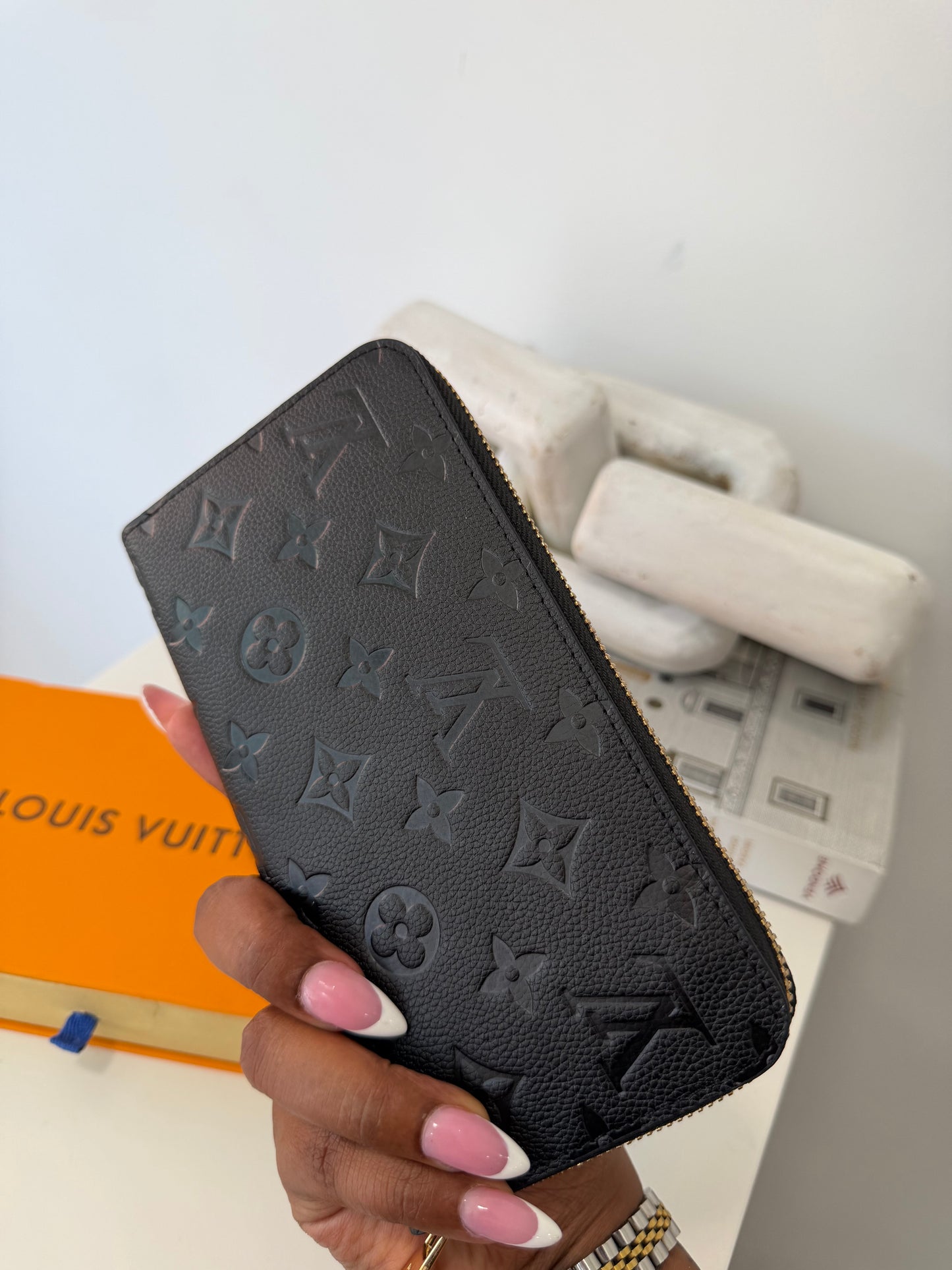 LOUIS VUITTON Embossed Monogram Zippy Wallet