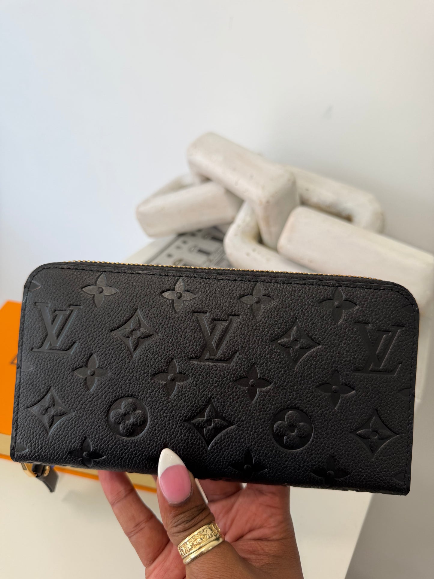 LOUIS VUITTON Embossed Monogram Zippy Wallet