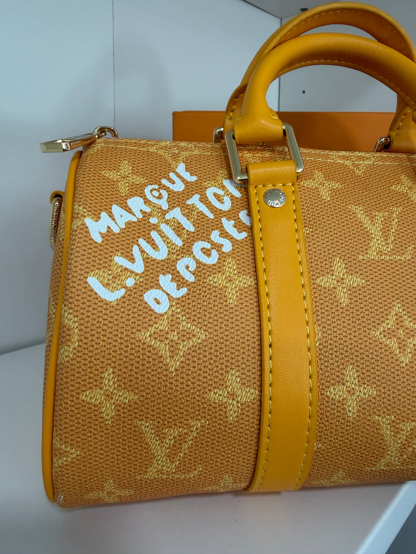 LOUIS VUITTON Keepall Bandouliere 25 (Yellow)