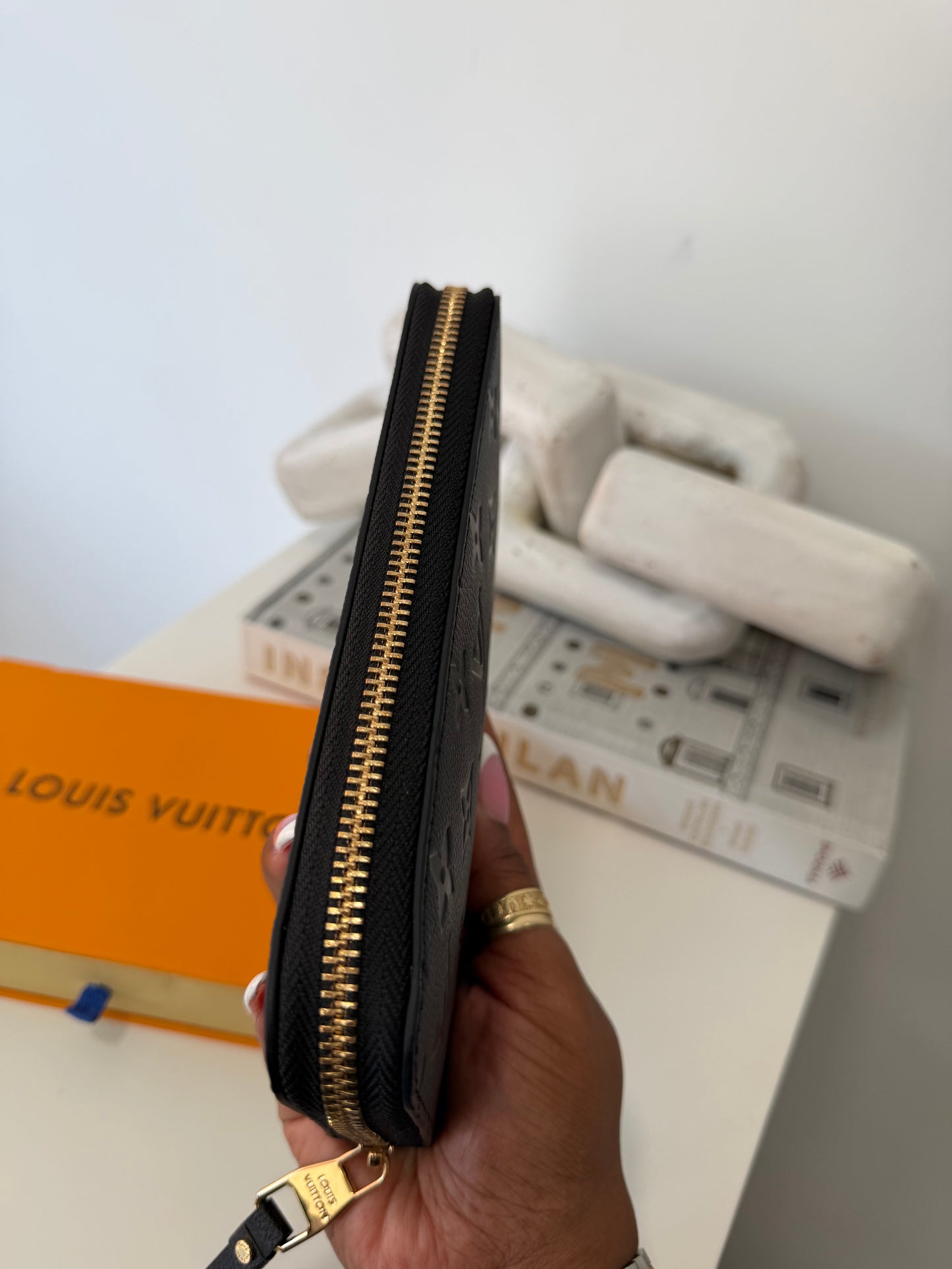 LOUIS VUITTON Embossed Monogram Zippy Wallet