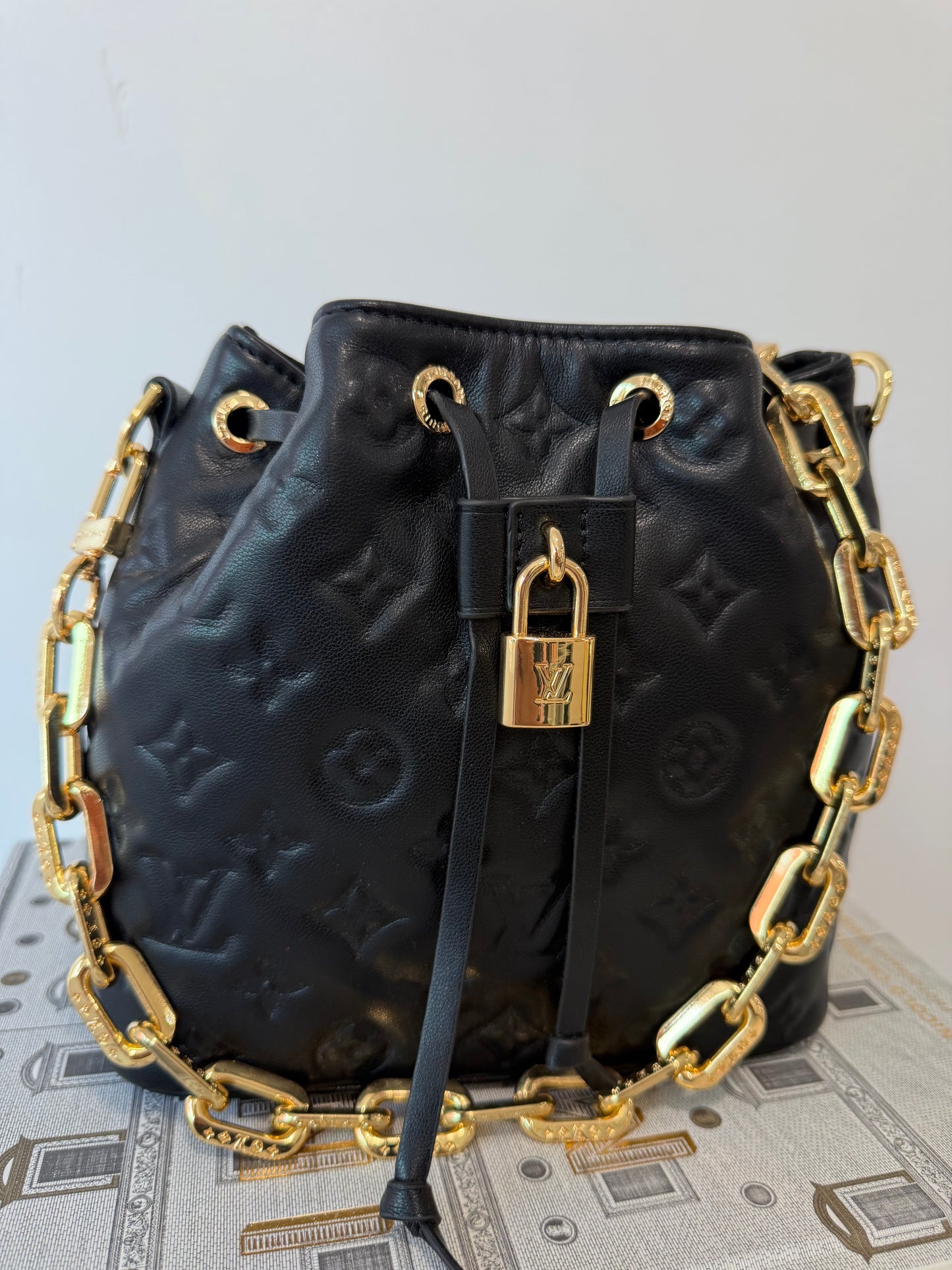 LOUIS VUITTON Embossed Monogram Coussin Bucket Bag