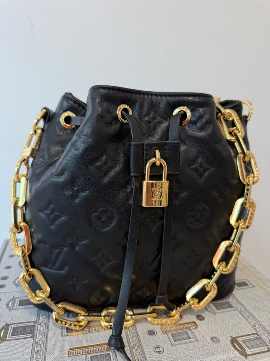LOUIS VUITTON Embossed Monogram Coussin Bucket Bag