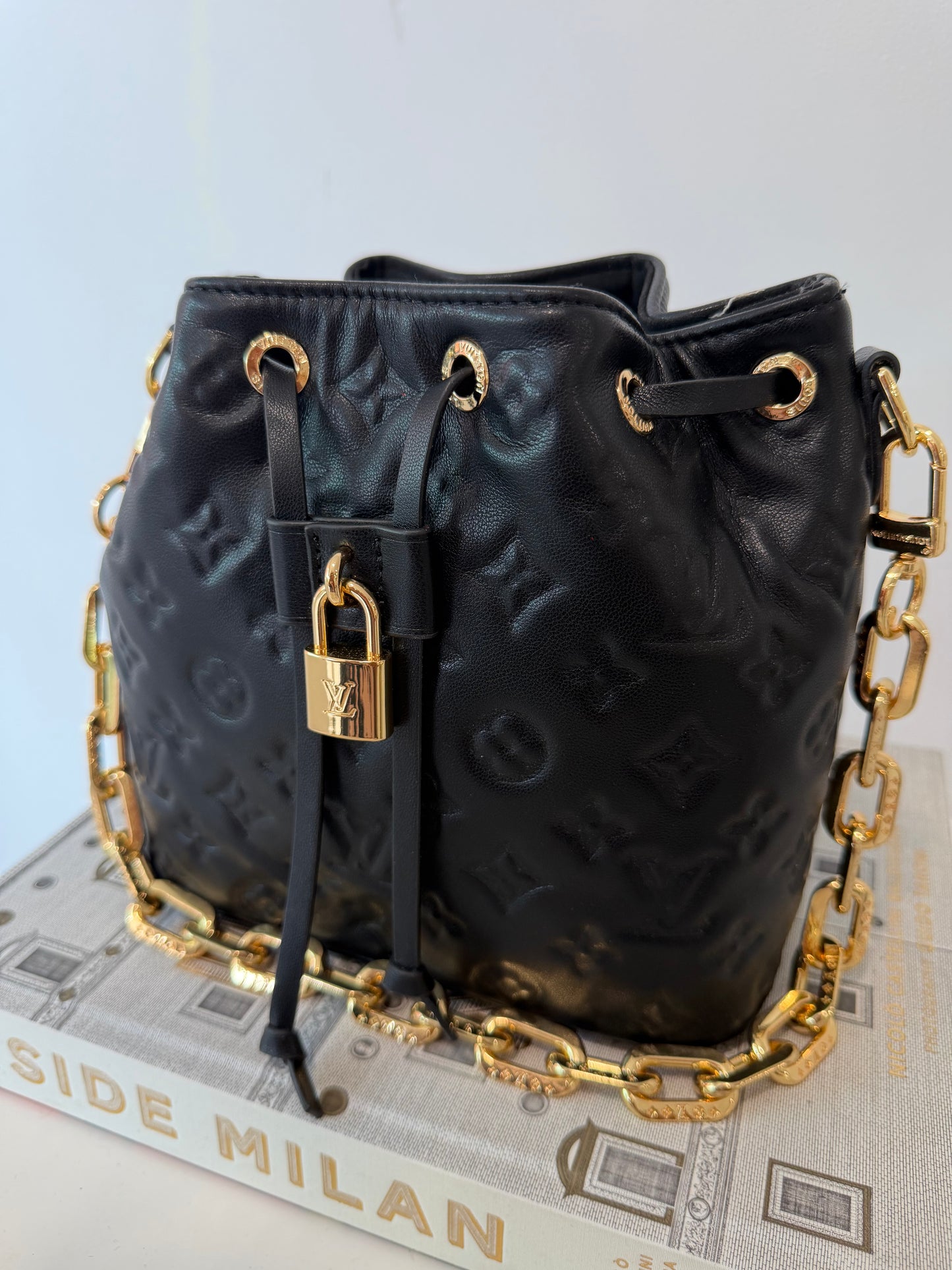 LOUIS VUITTON Embossed Monogram Coussin Bucket Bag